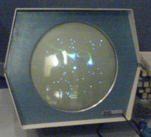 Spacewar! on the PDP-1's oscilloscope-like display.